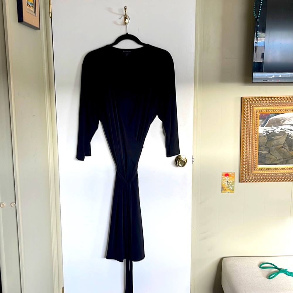 Wrap around dress with long tie.